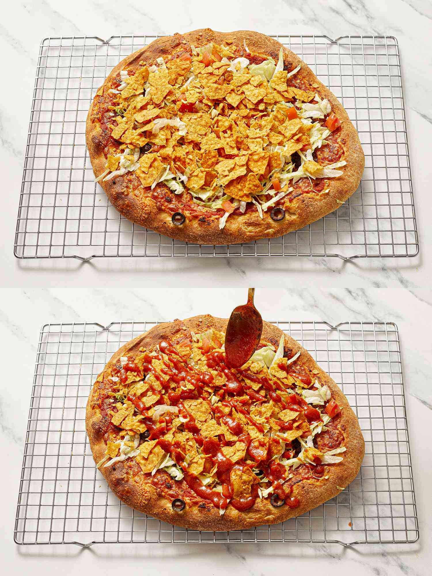 Two taco pizzas on cooling racks, one topped with crushed chips, the other with sauce being drizzled on top from a spoon.