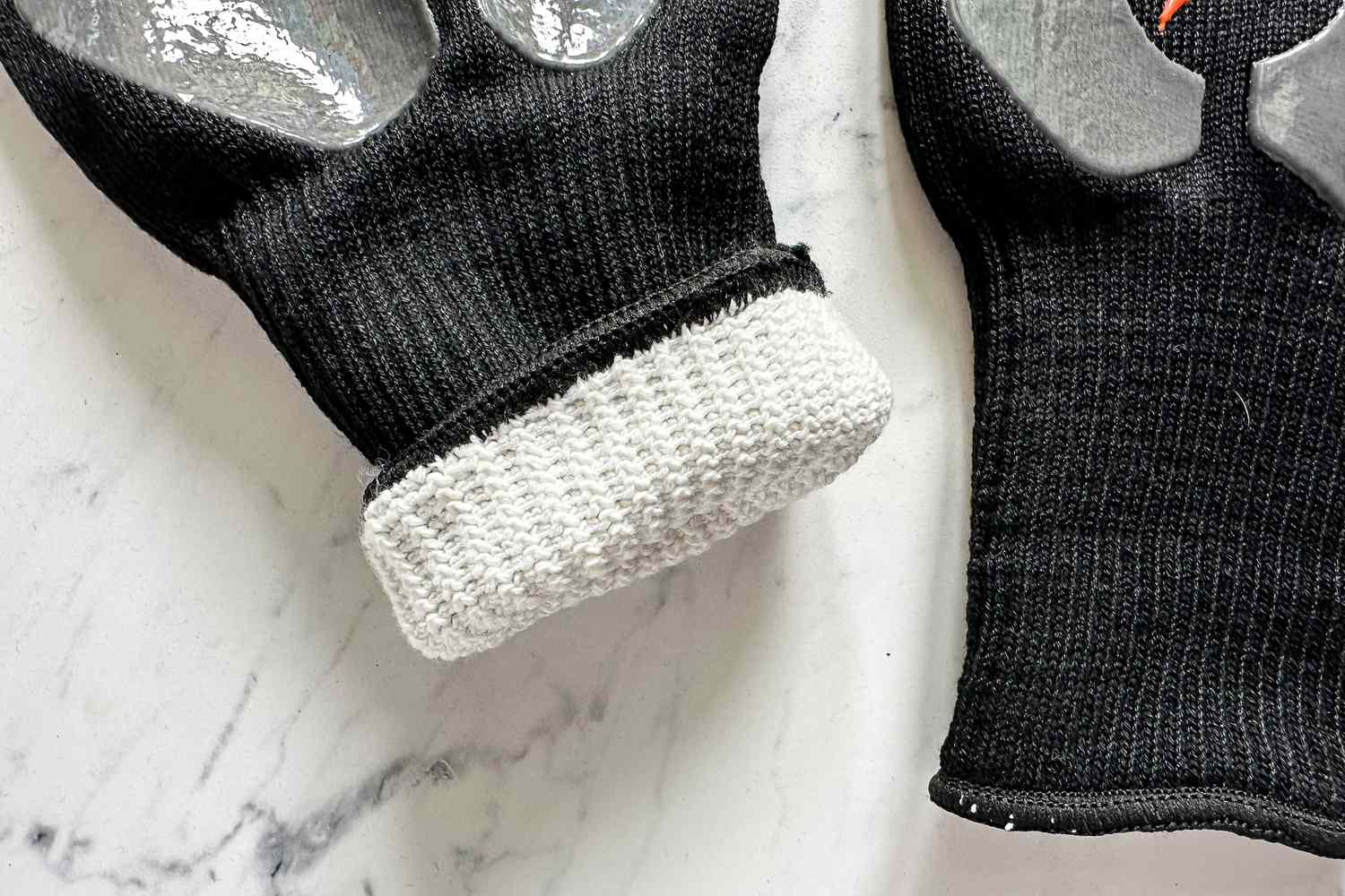 The cuff of the Blackstone Griddle Gloves is rolled up