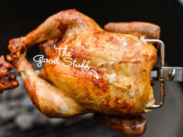 Closeup of the brined and air-dried chicken after cooking on the rotisserie. The skin is nicely browned. A particularly dark path is labeled "the good stuff."