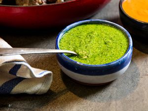 A small bowl of Italian salsa verde. 