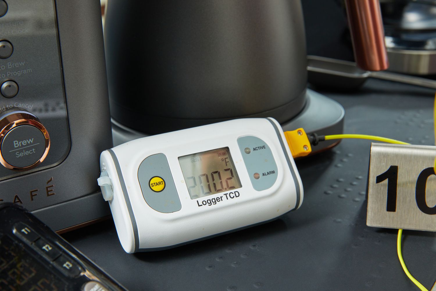 The temperature of coffee brewed in the CafÃ© Specialty Drip Coffee Maker is measured