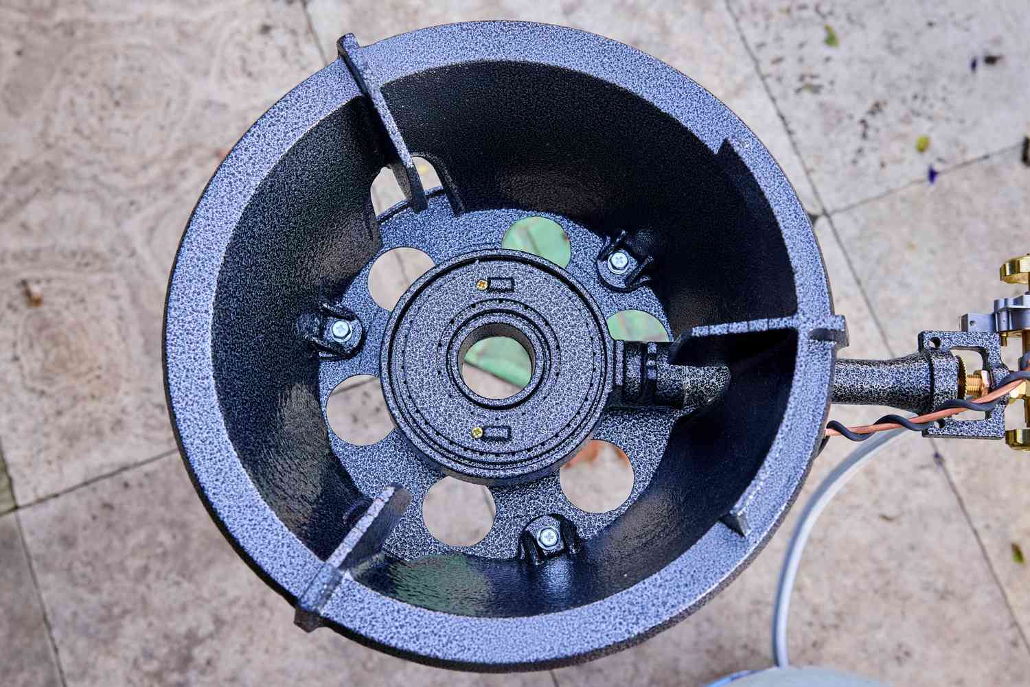The PowerFlamer outdoor wok burner on a patio.