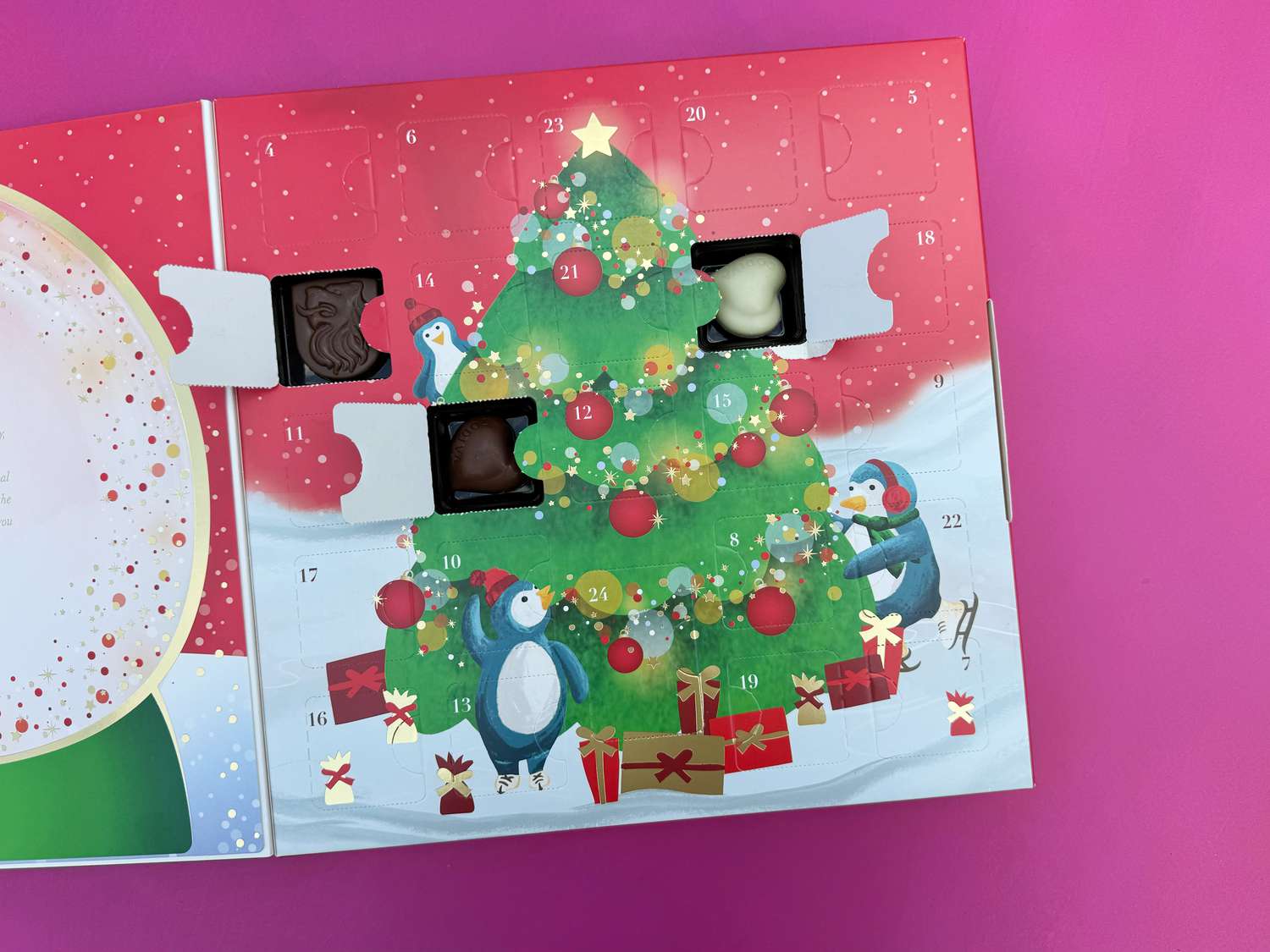 The Godiva advent calendar with a few windows open.