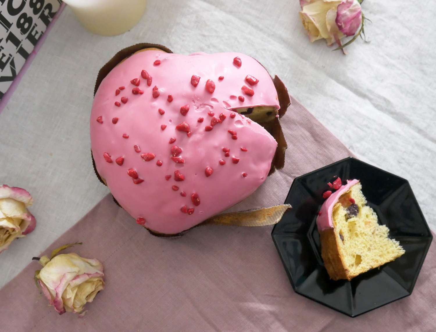 A pink heart-shaped panettone bread loaf
