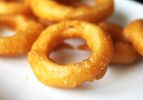 Closeup of freshly fried onion rings.