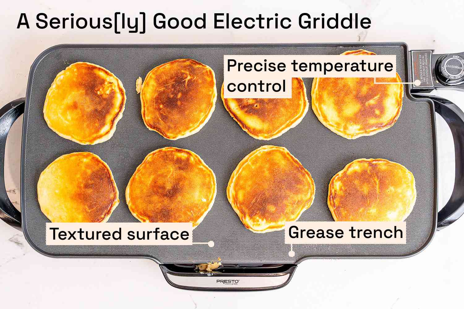 Pancakes cooking on an electric griddle