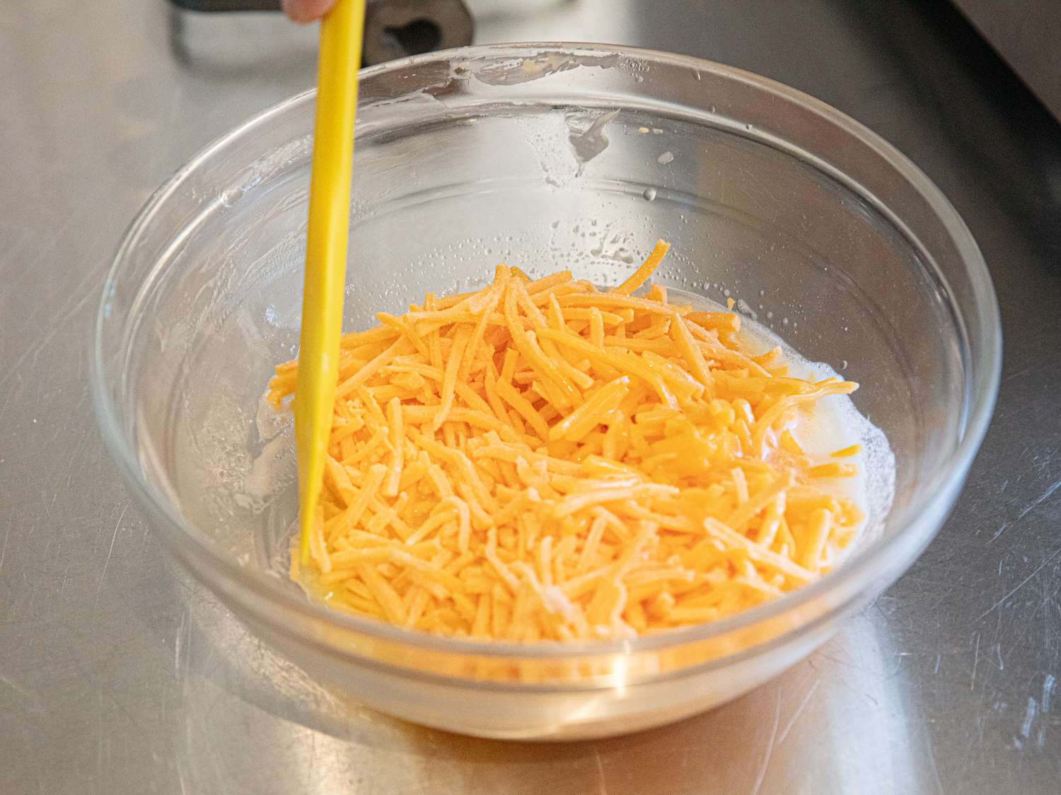 Cheese, butter, and Alka-Seltzer in a bowl.