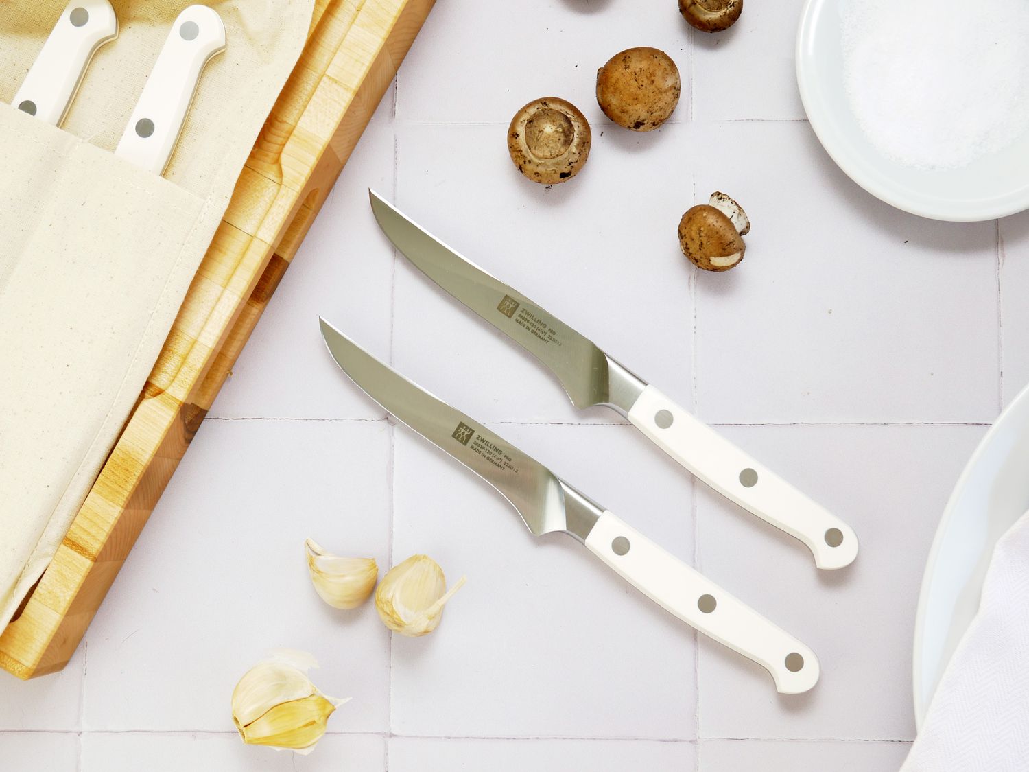 zwilling steak knives on a white surface