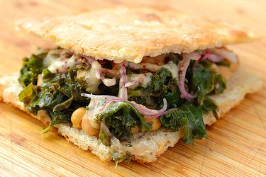 Braised Kale and Chickpea Sandwich with Sumac Onions