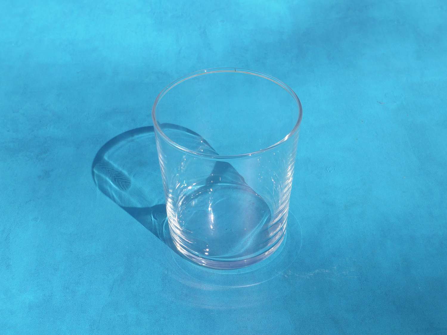 bormioli rocco glass on a blue backdrop