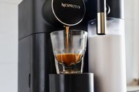 Espresso being dispensed into a cup by the Nespresso Gran Lattissima Original Espresso Machine by De’Longhi