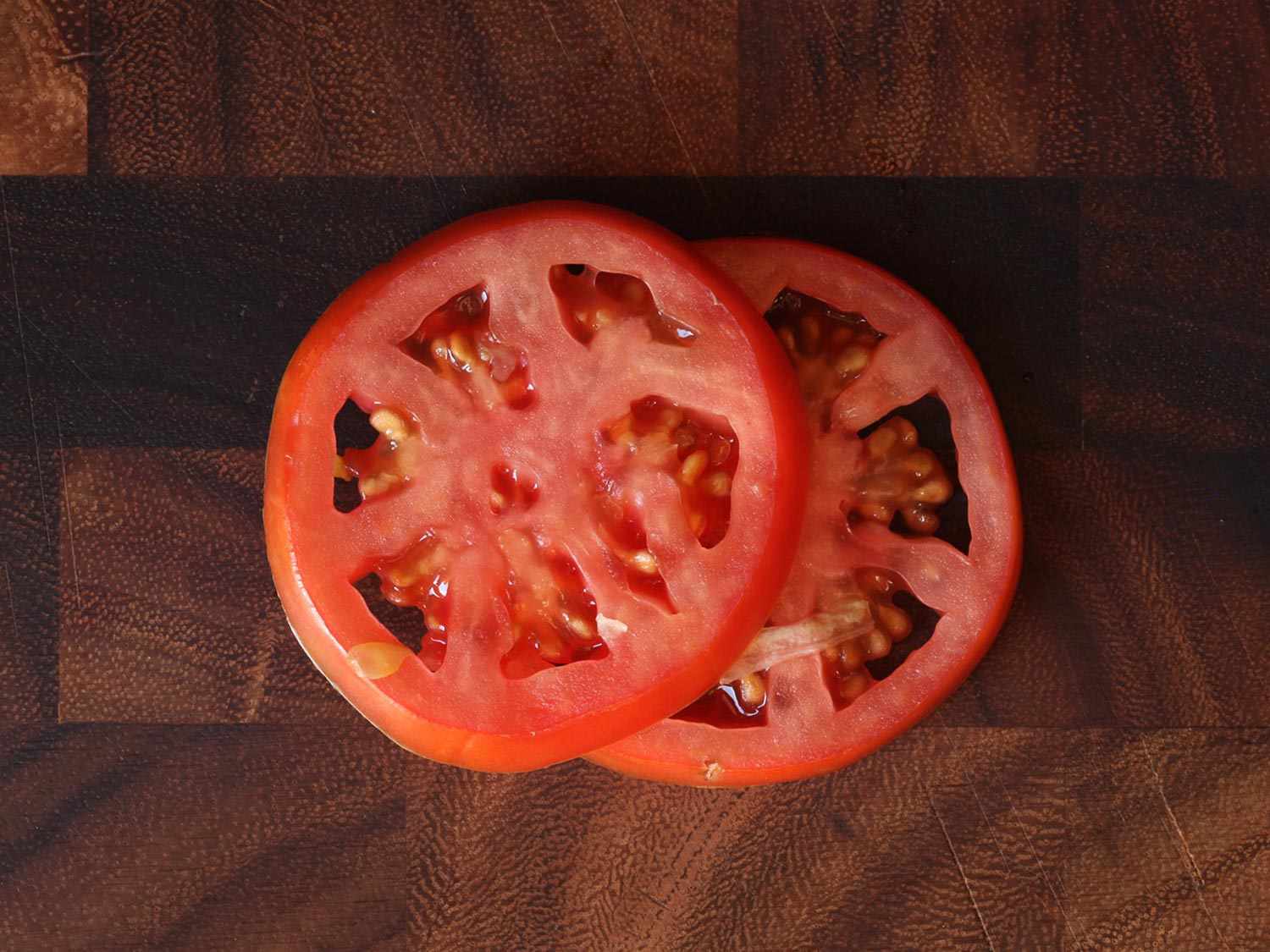 Two slices of tomato, as extracted from a Whopper.