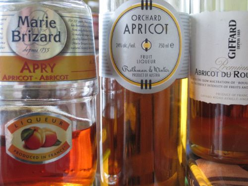 An assortment of bottles of apricot brandy