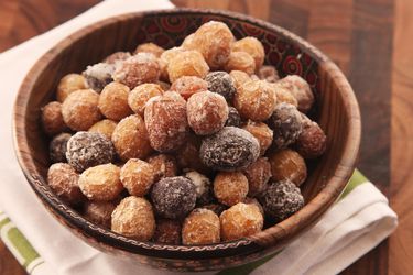 Wooden serving bowl of salt-crusted assorted new potatoes