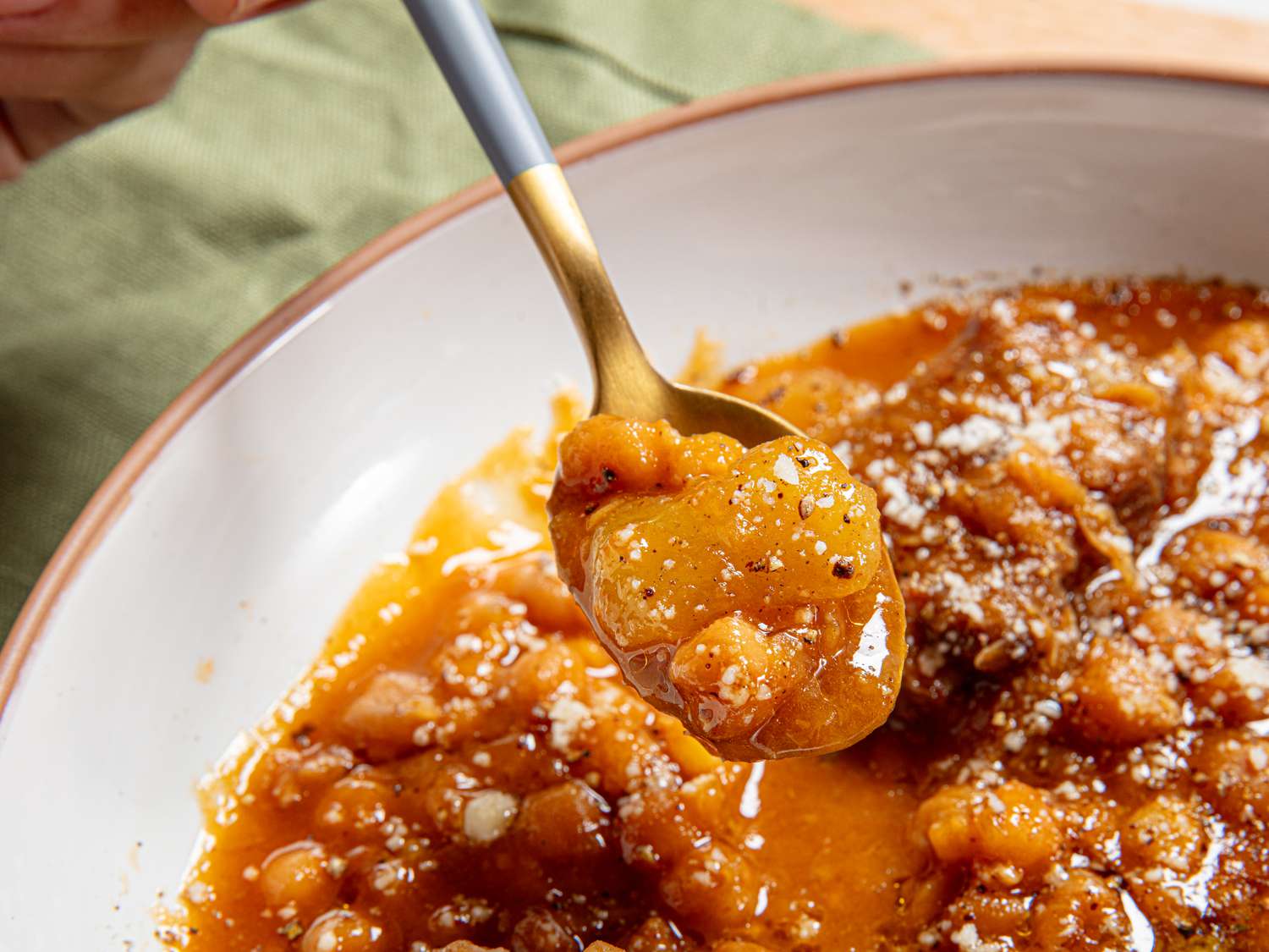 Lifting a spoon of stew