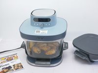 chicken wings cooking in the ninja crispi pro