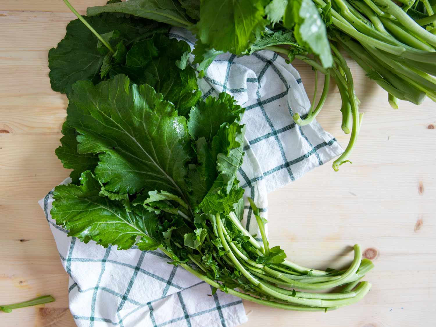 Uncooked broccoli rabe.