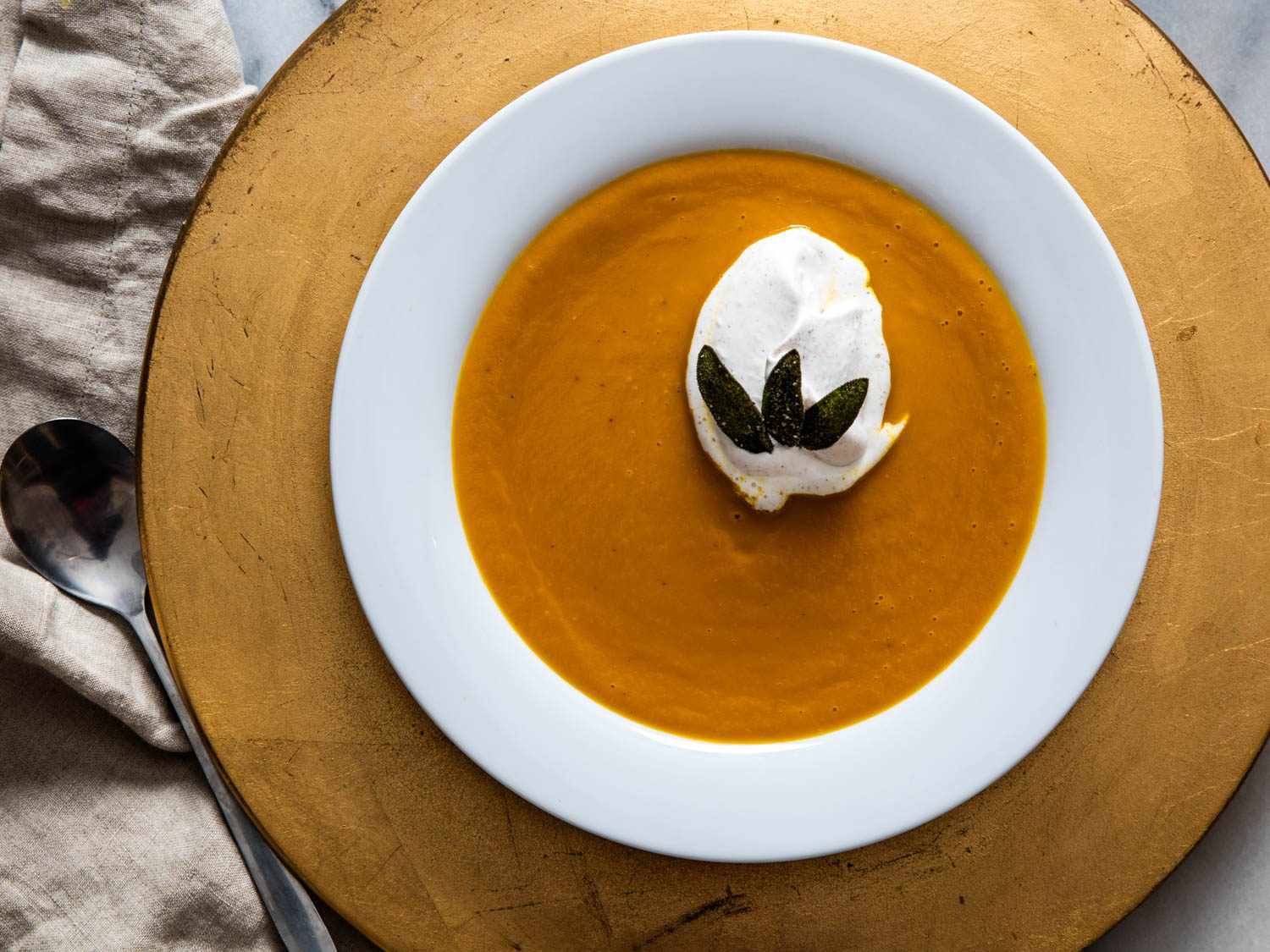 Roast butternut squash soup in serving bowl.