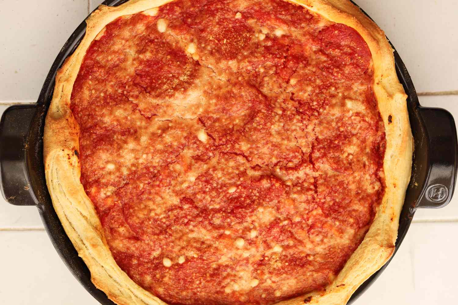 Overhead shot of the pizza using the Emile Henry Deep Dish Pizza Pan