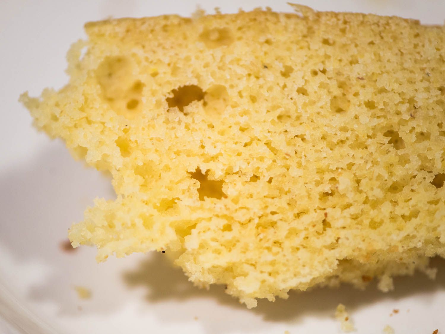 A close up of too tender cornbread.