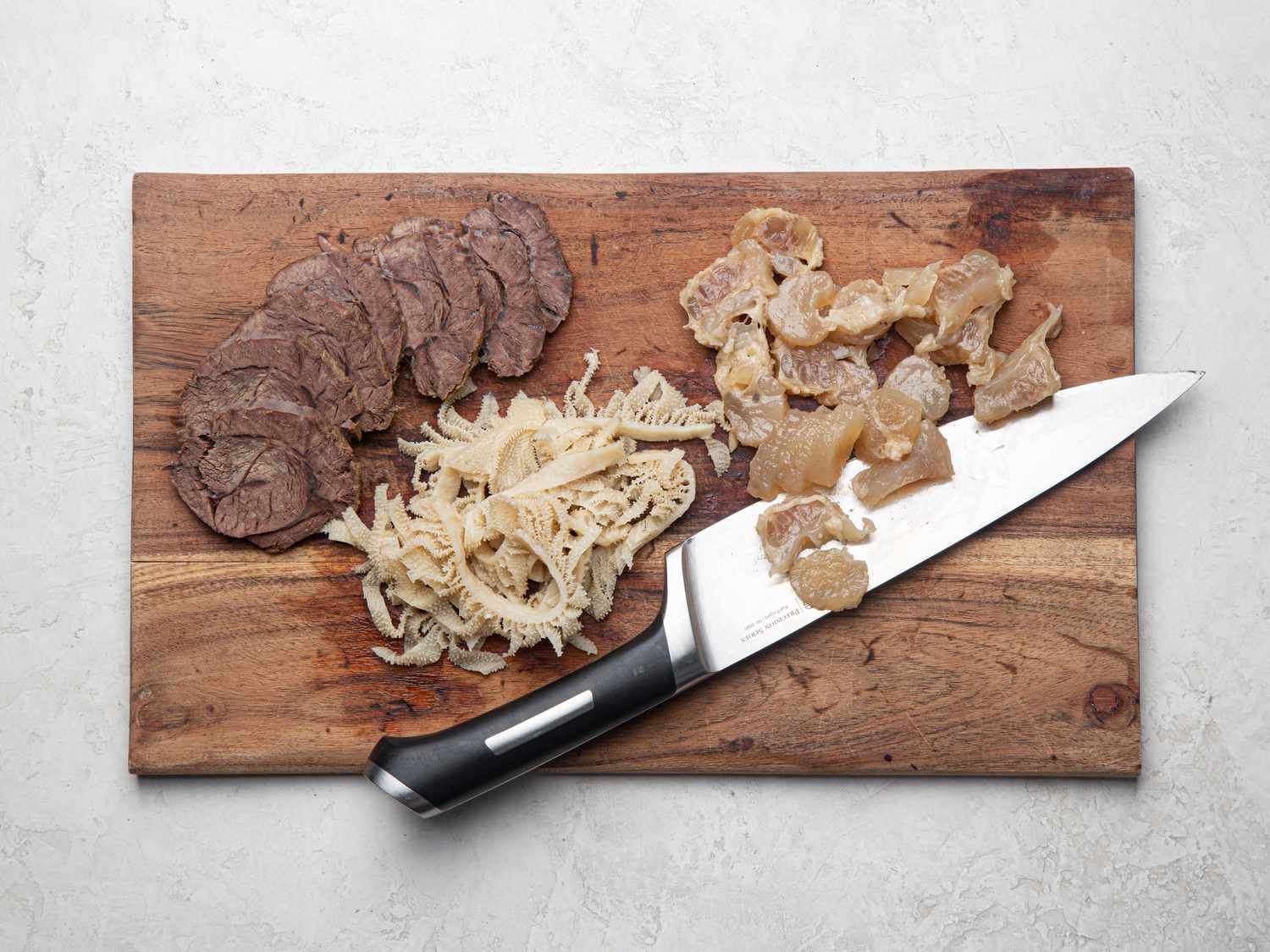 Meet sliced on a cutting board