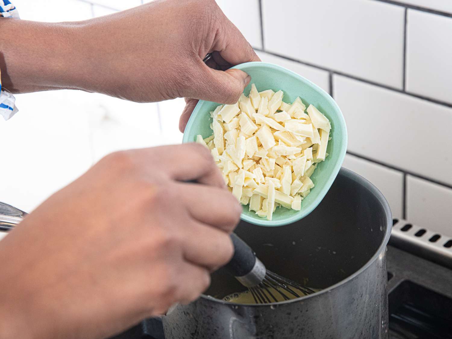 Side view of adding white chocolate