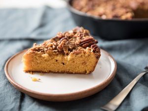Side view of plated slice of pumpkin skillet coffee cake