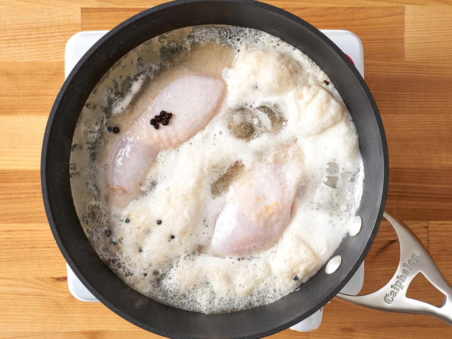 Chicken and peppercorns boiling.