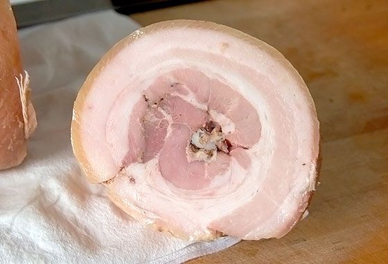 cross-section of sous-vide cooked pork belly porchetta