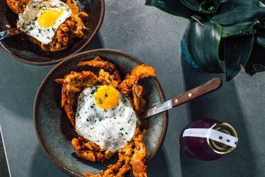 Food at Bearcat in New Orleans: a fried egg on fried crab in a bowl.