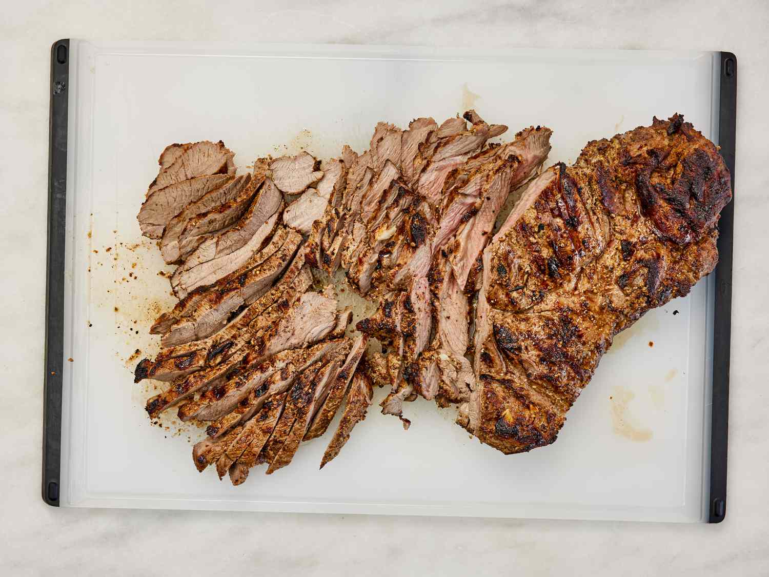Overhead view of lamb cut on cutting board