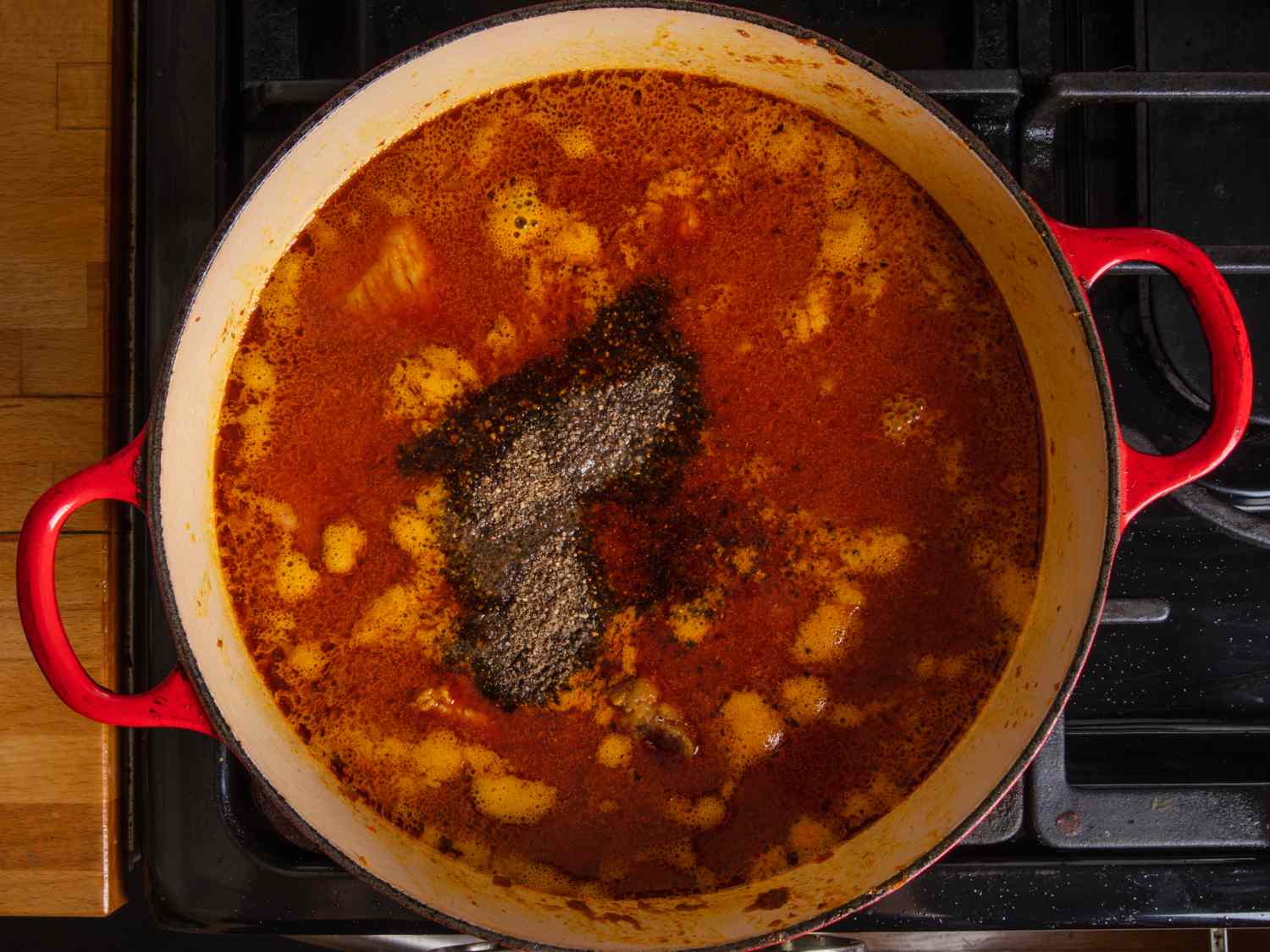 black pepper, fish sauce, and sugar added to pot