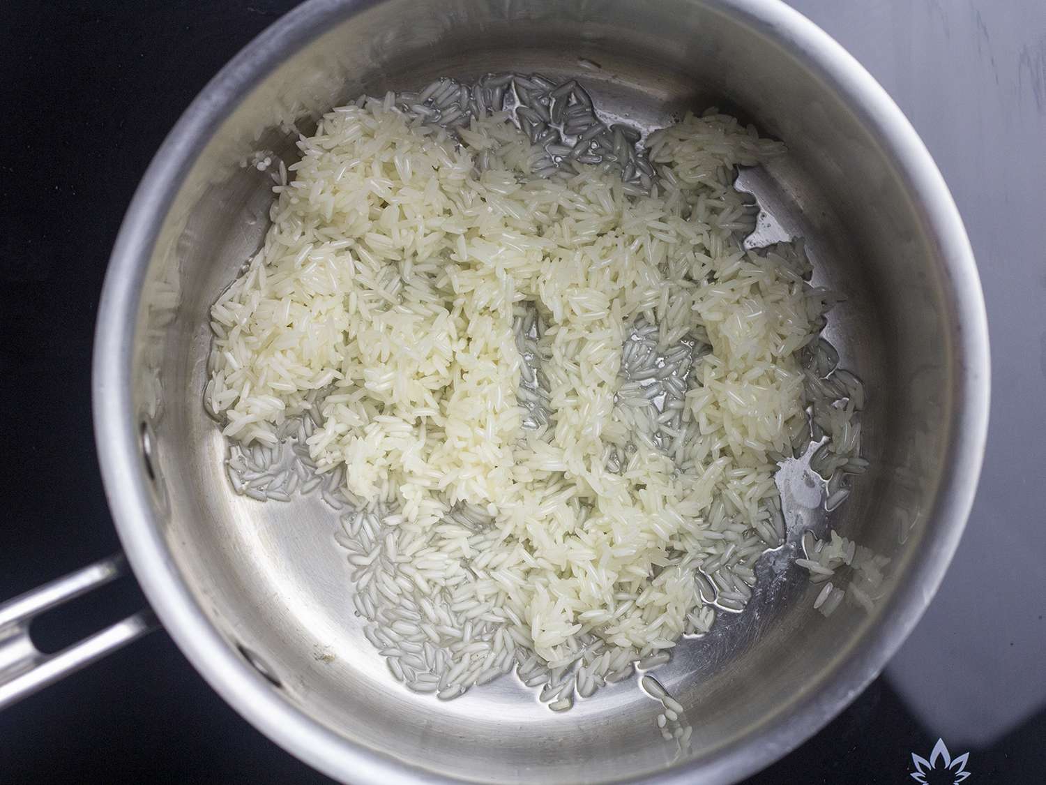 Rice toasting in chicken fat.