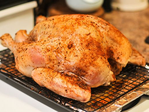 Whole turkey on rack rubbed with spices