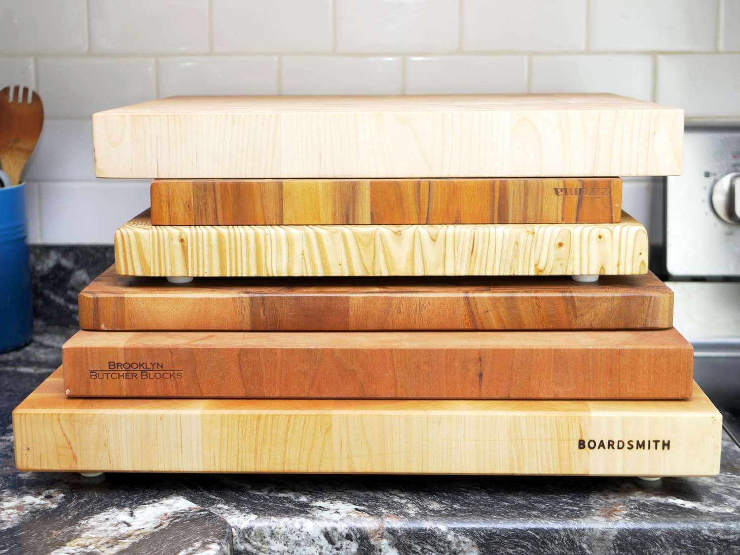 a stack of wooden cutting boards