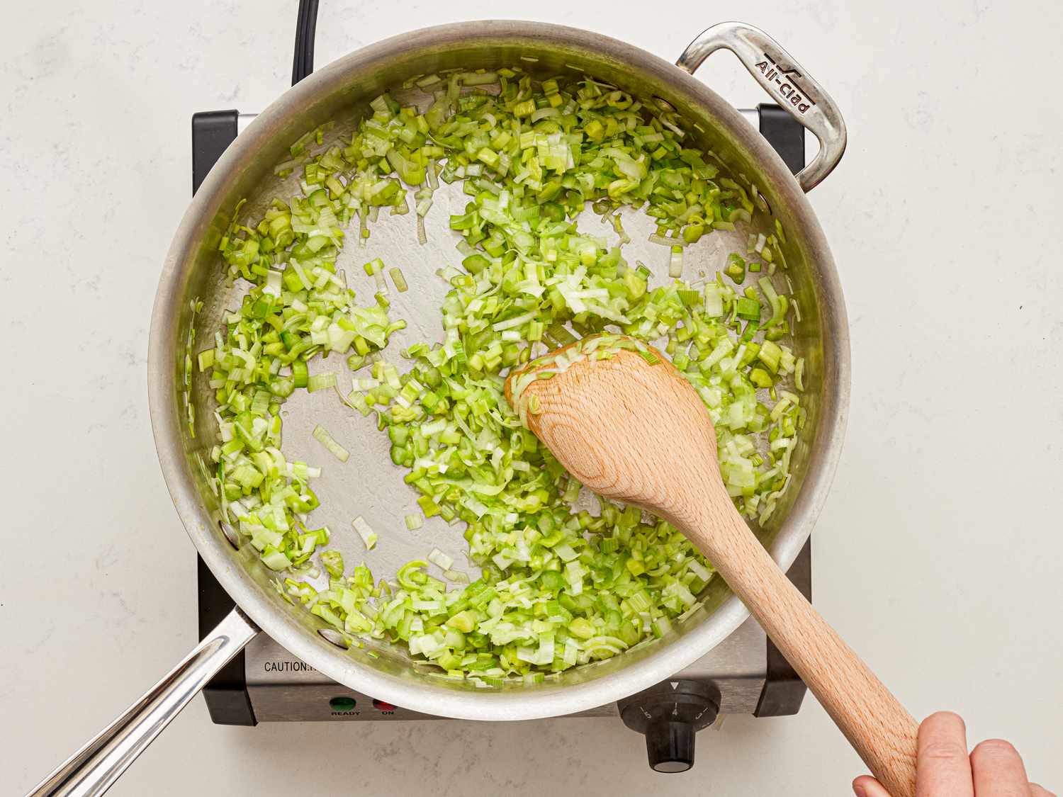 Overhead view of cooking leeks