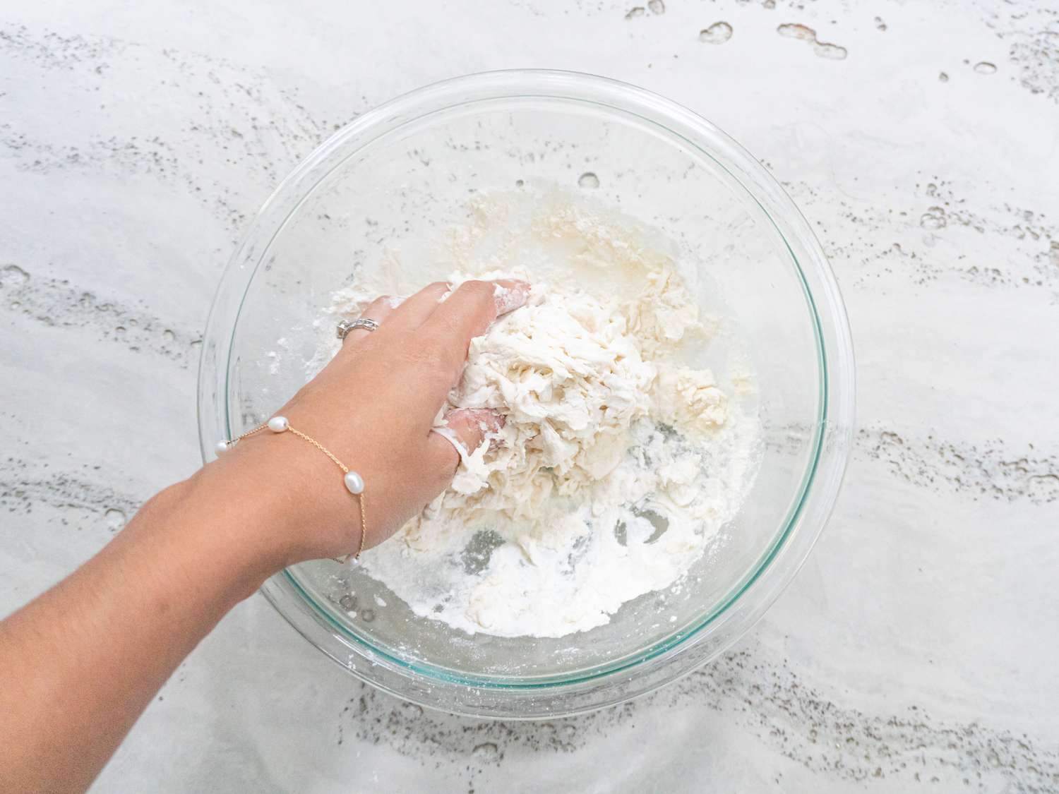 Overhead view of kneading dough 