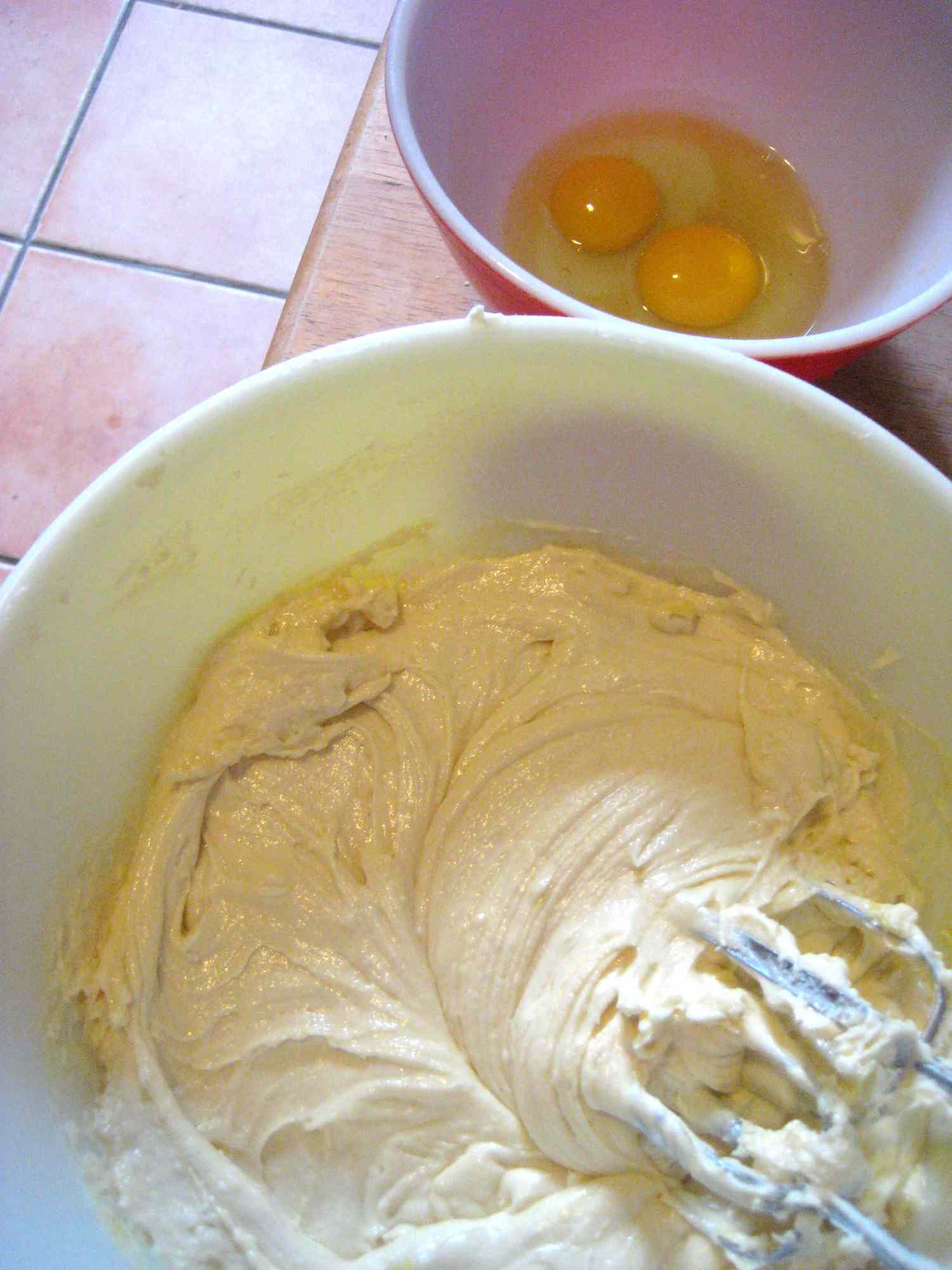 The creamcheese, butter, and shortening are mixed in a bowl.