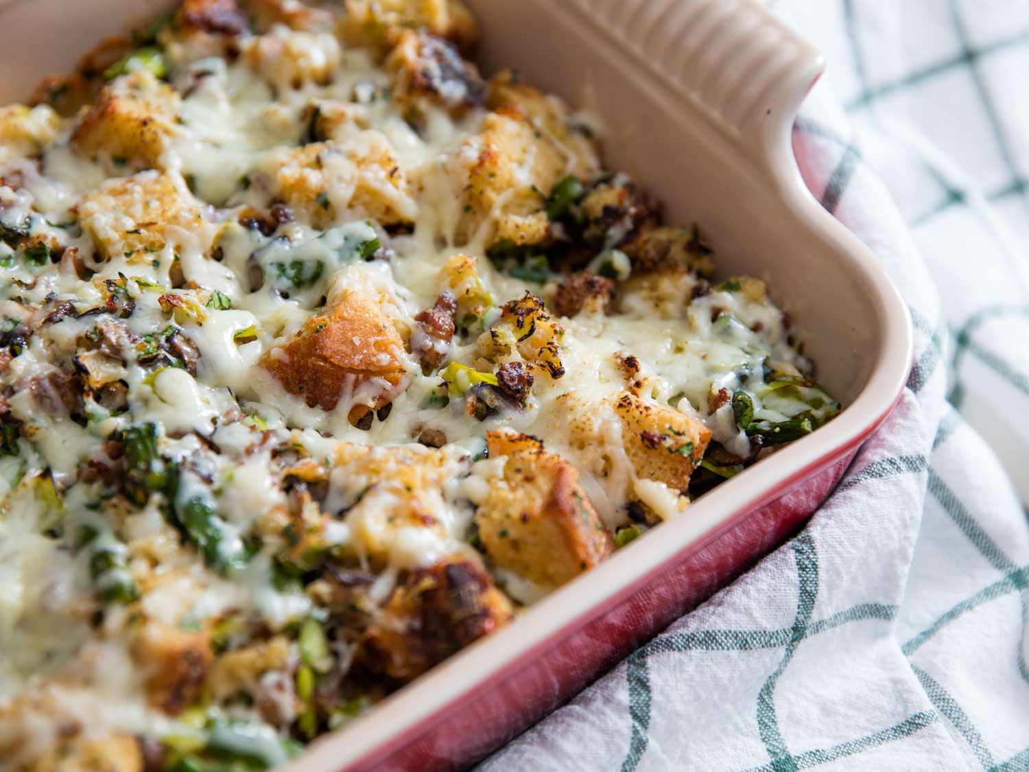 Closeup of Spring Strata With Asparagus, Leeks, Sausage, and Cheese.
