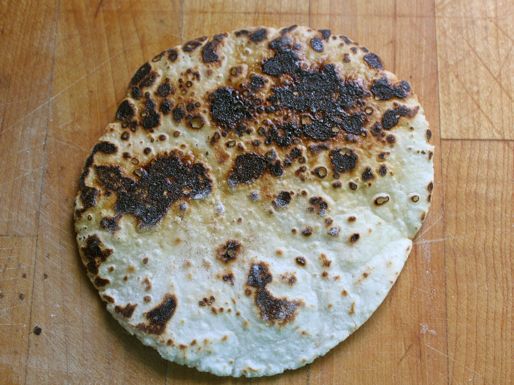 A sad, heavily charred tortilla.
