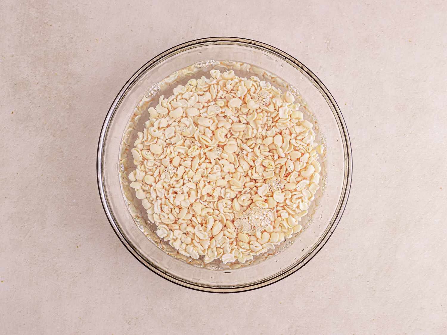 Overhead view of peas with skins with removed