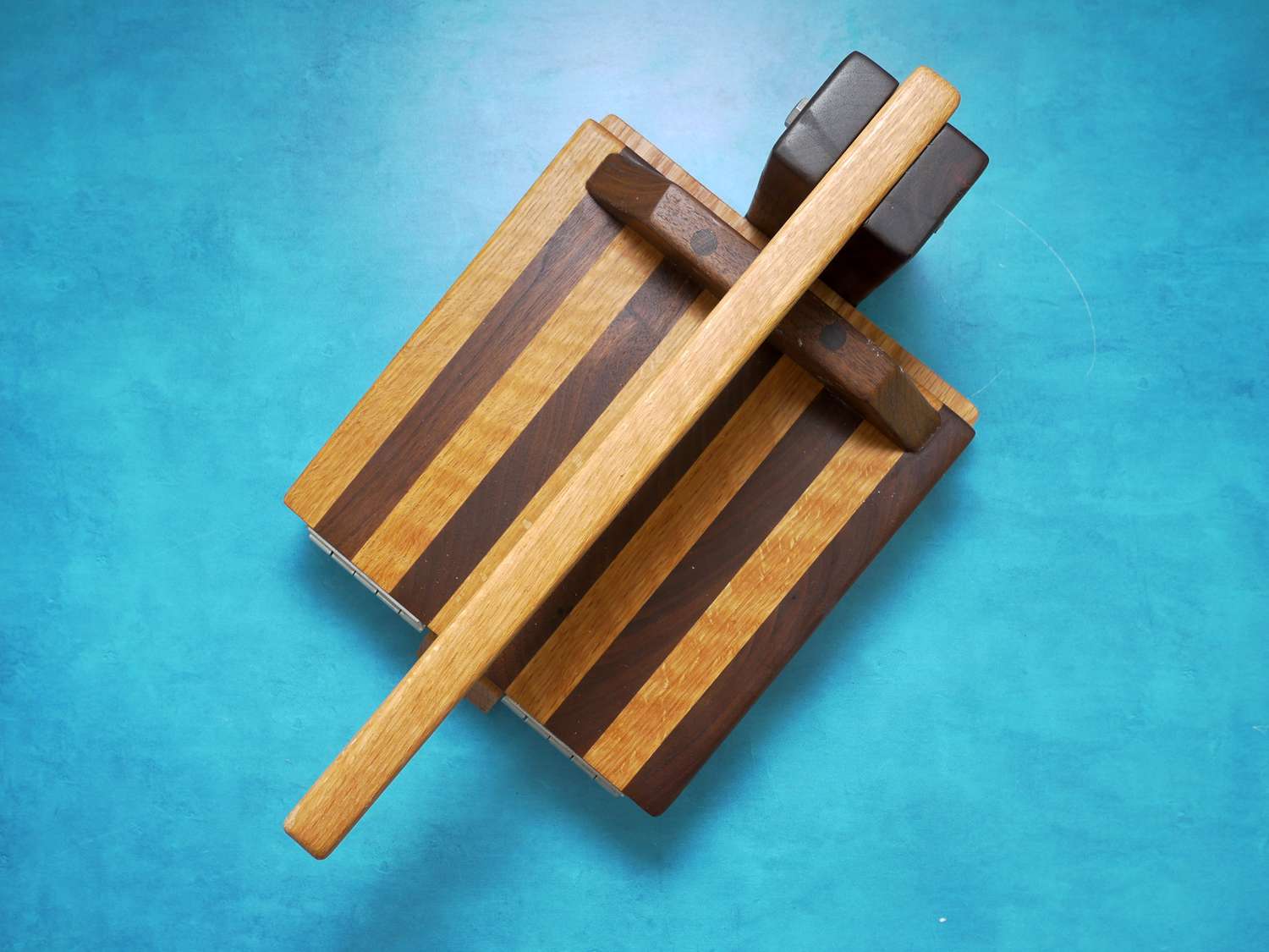 central coast hardwood tortilla press on blue backdrop