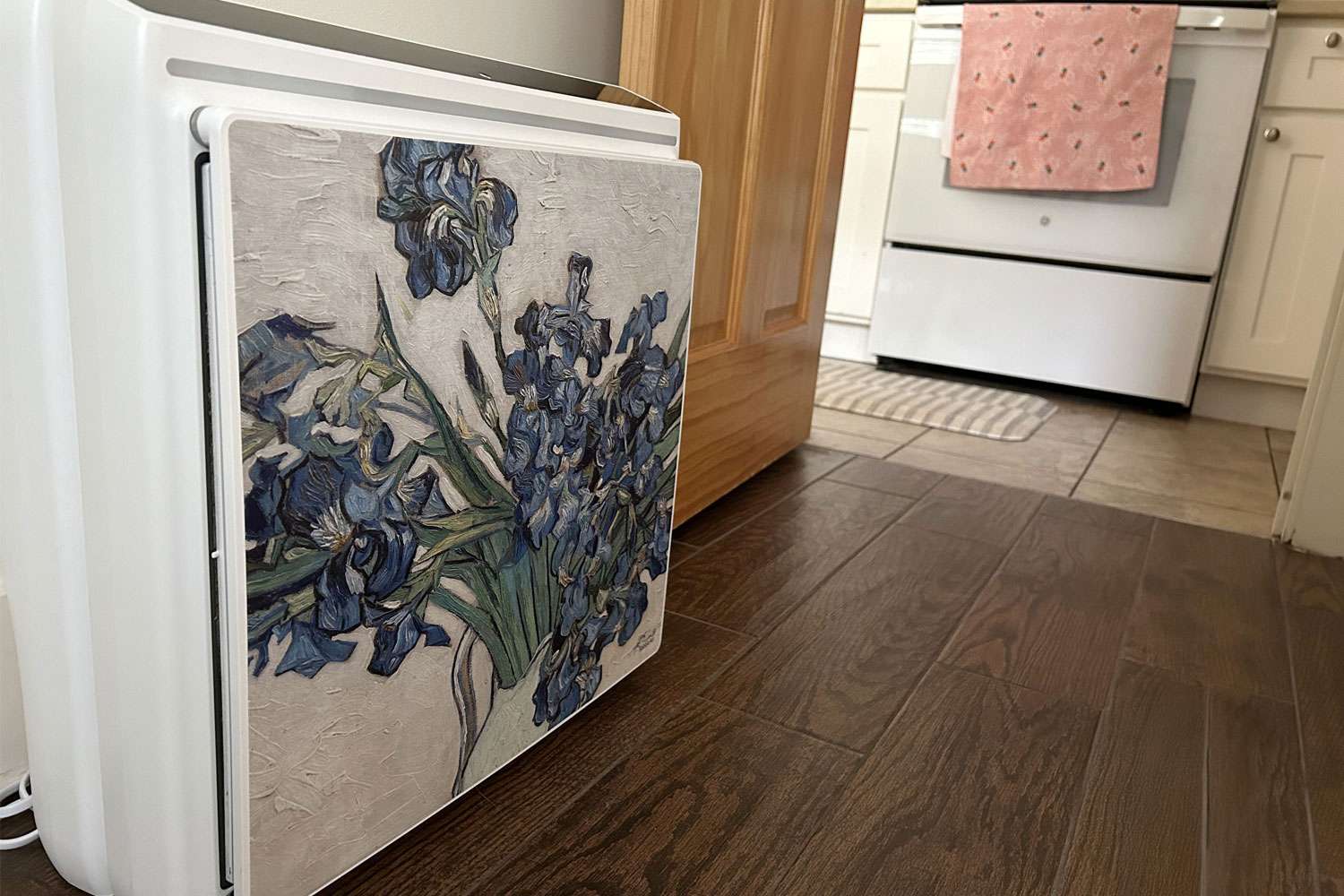 The Rabbit A3 air purifier sits near a kitchen doorway.