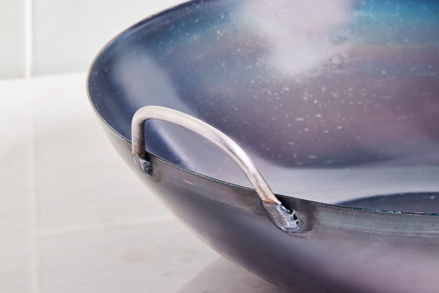 Close up of the Yosukata Carbon Steel Wok Pan handle 