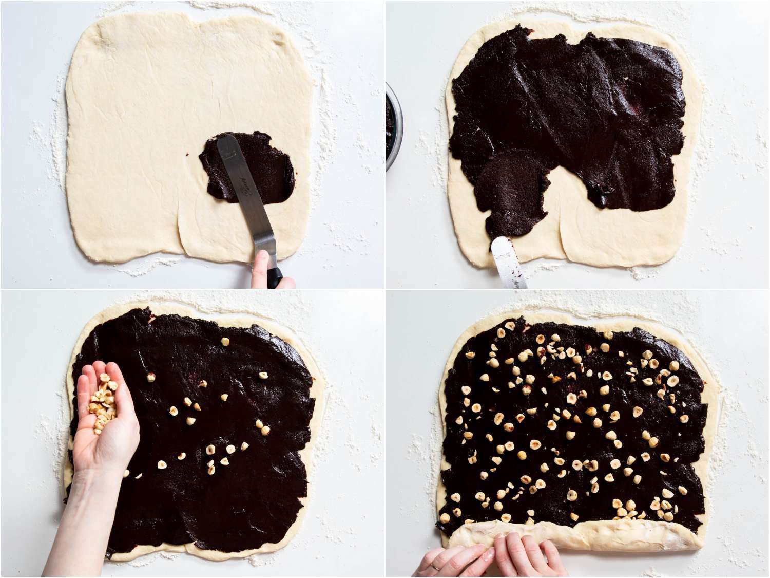 spreading homemade Nutella and roasted hazelnuts over a sheet of yeasted dough