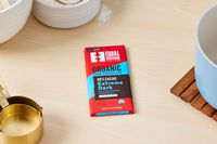 A wrapped Equal Exchange chocolate bar.