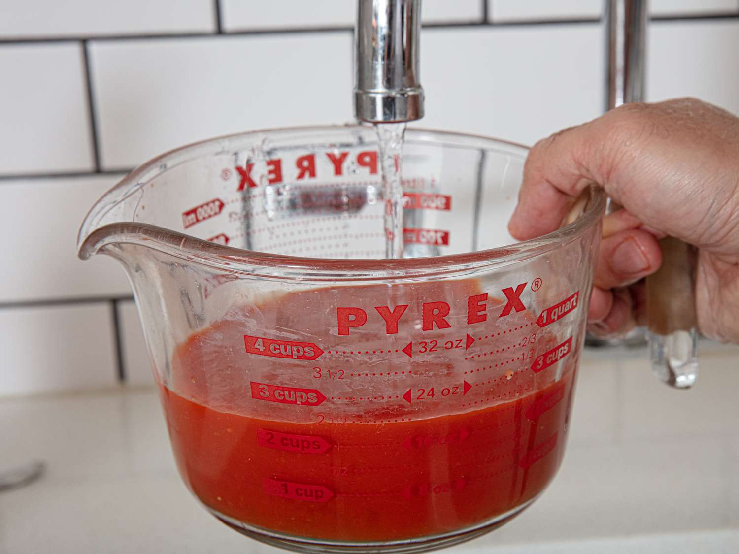 Adding water to tomato