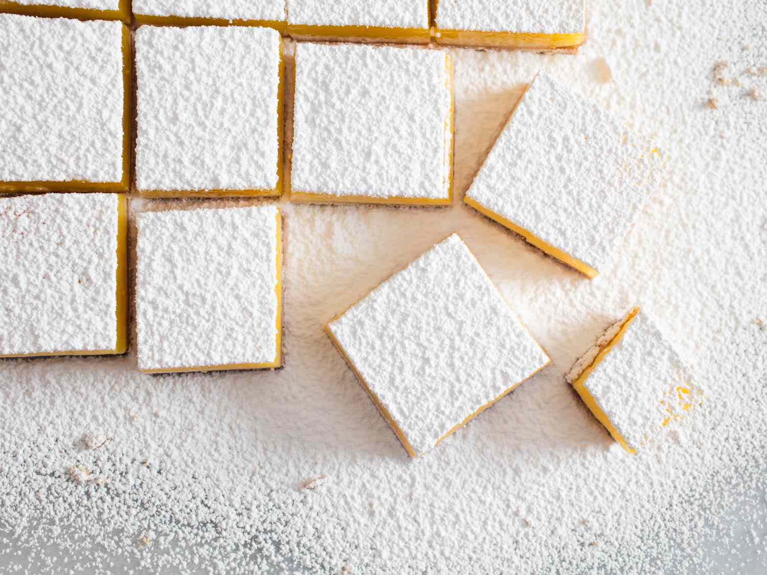 lemon bars dusted with powdered sugar