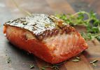 A skin-on salmon fillet that has been cooked sous vide and then seared.