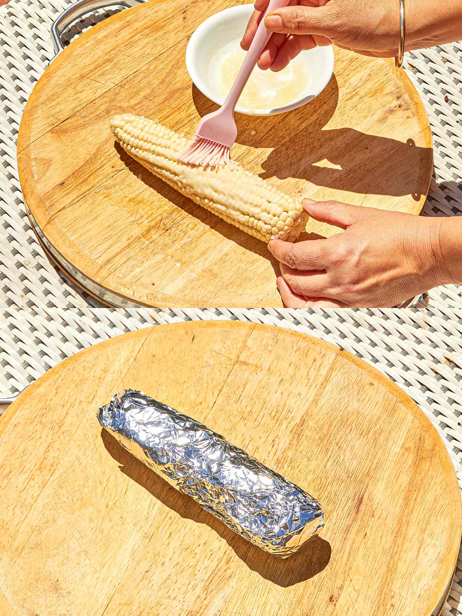 Process of preparing corn for grilling being buttered and then wrapped in foil
